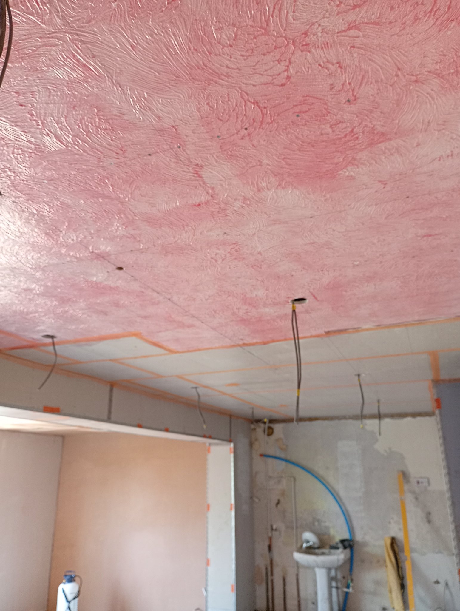 Old artex ceiling prepared with bonding agent before over skimming in Whitstable