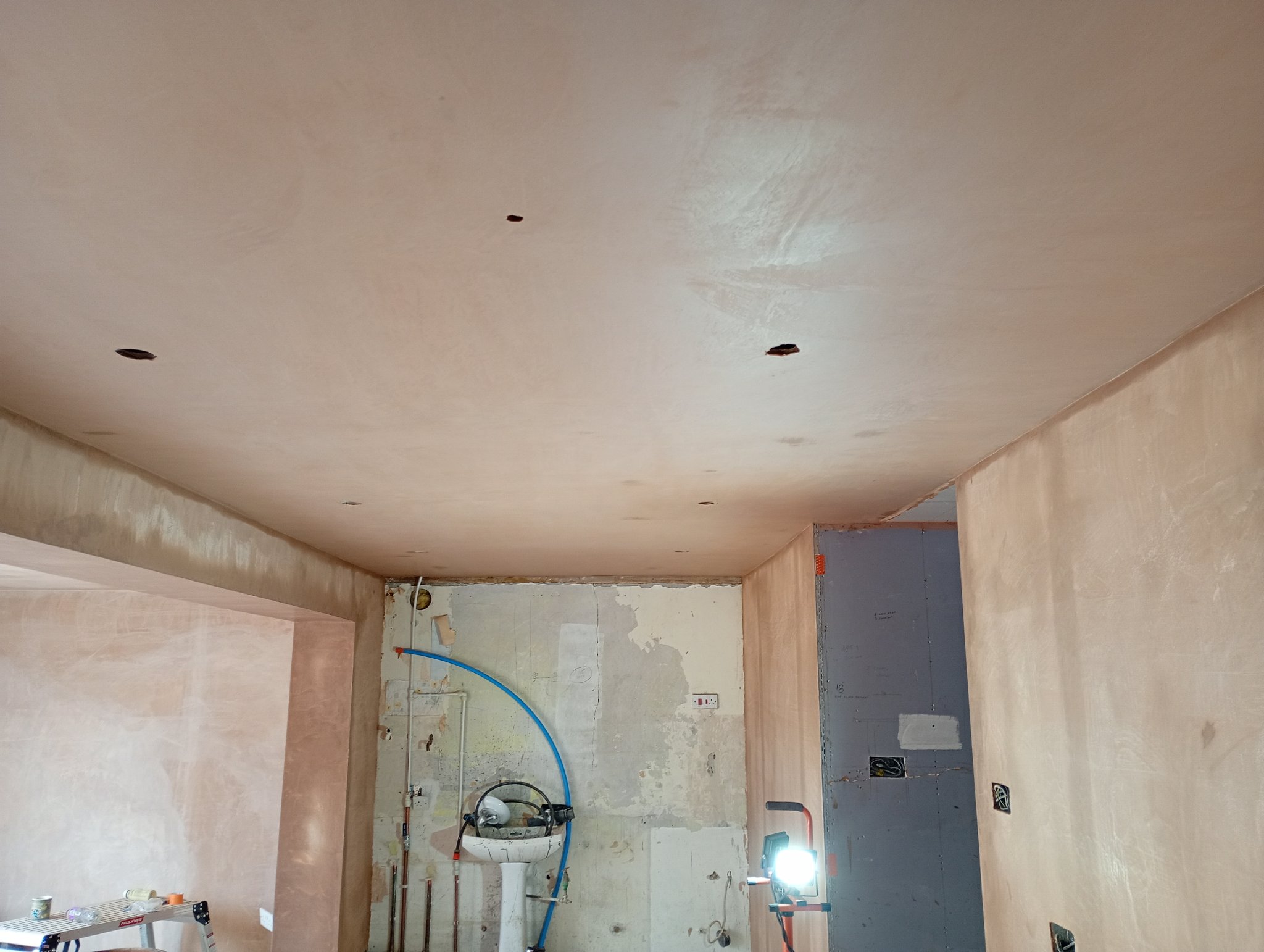 Smooth skimmed ceiling in the open plan area after plastering in Whitstable